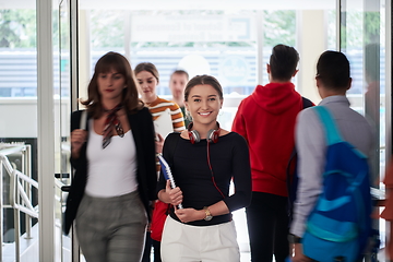 Image showing famel student with modern technology in school