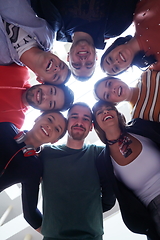 Image showing group of happy young people showing their unity