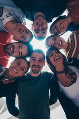 Image showing group of happy young people showing their unity