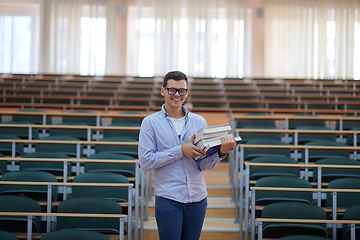 Image showing man with book in calssroom