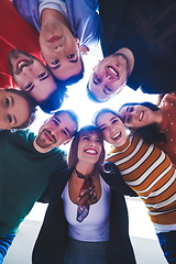 Image showing group of happy young people showing their unity