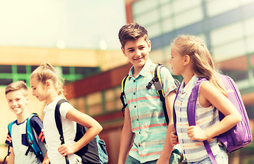 Image showing group of happy elementary school students walking