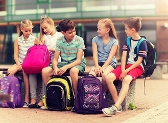 Image showing group of happy elementary school students talking