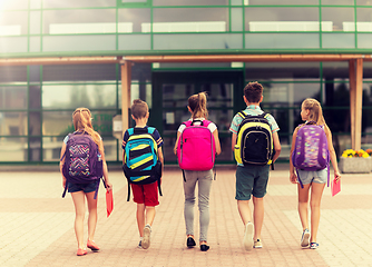 Image showing group of happy elementary school students walking