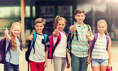 Image showing happy elementary school students showing thumbs up