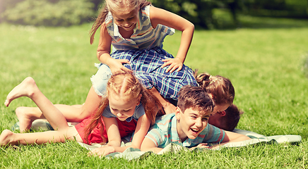 Image showing happy kids playing and having fun in summer park