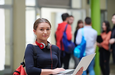 Image showing famel student with modern technology in school