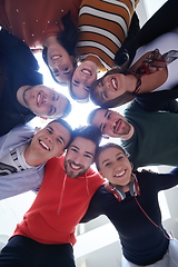 Image showing group of happy young people showing their unity