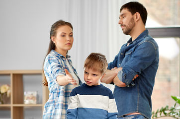 Image showing unhappy little boy over arguing parents at home