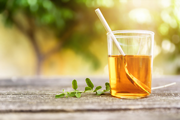 Image showing verbena tea on old wooden planks