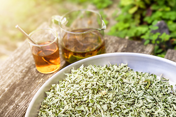 Image showing verbena tea on old wooden planks