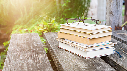 Image showing books and reading glasses