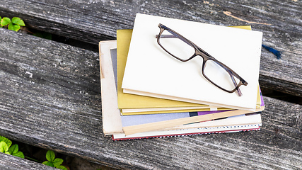 Image showing books and reading glasses