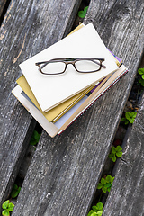 Image showing books and reading glasses