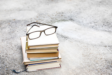 Image showing books and reading glasses