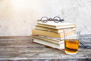 Image showing books and reading glasses