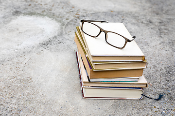 Image showing books and reading glasses