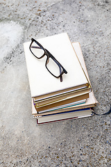 Image showing books and reading glasses