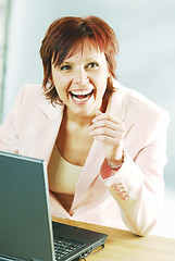 Image showing A woman with a notebook