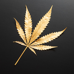 Image showing golden Cannabis leaf isolated on black