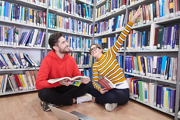 Image showing the students uses a notebook, laptop and a school library