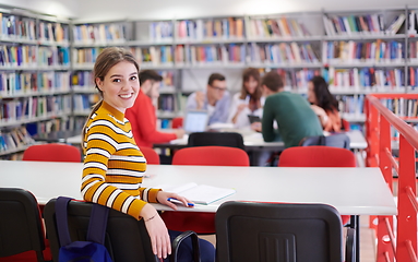 Image showing student taking notes for school class