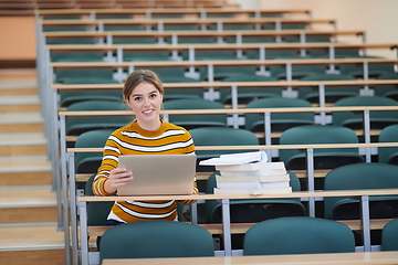 Image showing student taking notes for school class