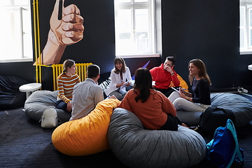 Image showing students using modern technology for school project