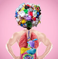 Image showing We are what we eat - concept of environmental pollution of plastic