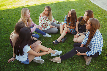 Image showing Happy women outdoors on sunny day. Girl power concept.