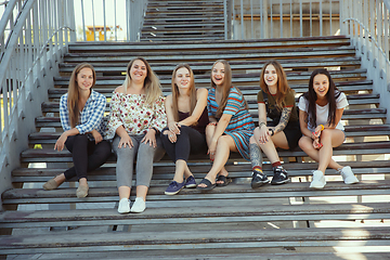 Image showing Happy women outdoors on sunny day. Girl power concept.