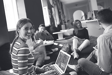 Image showing students using modern technology for school project