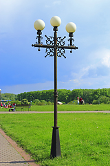 Image showing beautiful white round lanterns in city park