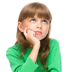 Image showing Young girl is daydreaming