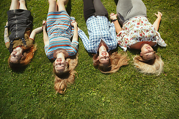 Image showing Happy women outdoors on sunny day. Girl power concept.