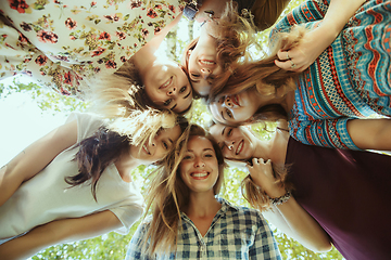 Image showing Happy women outdoors on sunny day. Girl power concept.