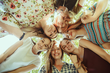 Image showing Happy women outdoors on sunny day. Girl power concept.