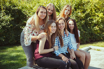 Image showing Happy women outdoors on sunny day. Girl power concept.