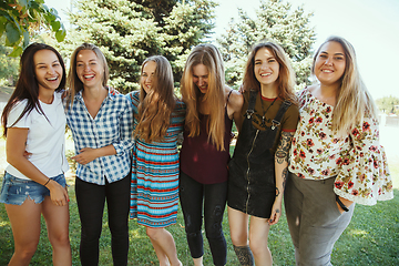 Image showing Happy women outdoors on sunny day. Girl power concept.