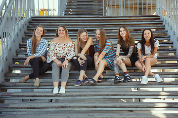 Image showing Happy women outdoors on sunny day. Girl power concept.