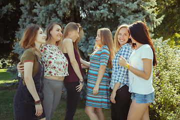 Image showing Happy women outdoors on sunny day. Girl power concept.