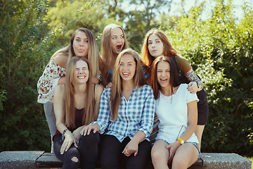 Image showing Happy women outdoors on sunny day. Girl power concept.