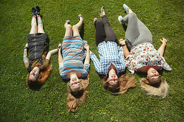 Image showing Happy women outdoors on sunny day. Girl power concept.