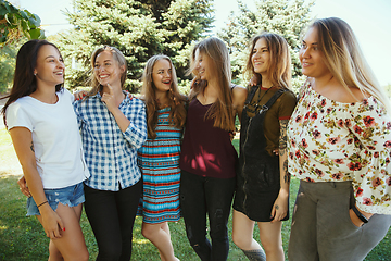 Image showing Happy women outdoors on sunny day. Girl power concept.