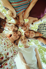 Image showing Happy women outdoors on sunny day. Girl power concept.