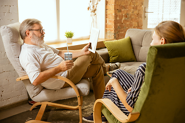 Image showing Senior man working with tablet at home - concept of home studying