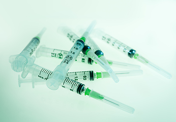 Image showing Syringes on blue background