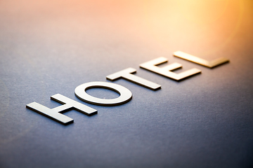 Image showing Word hotel written with white solid letters
