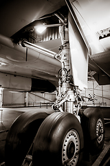 Image showing Airplane landing gear detail. Black and white photo