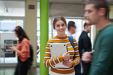 Image showing famel student with modern technology in school